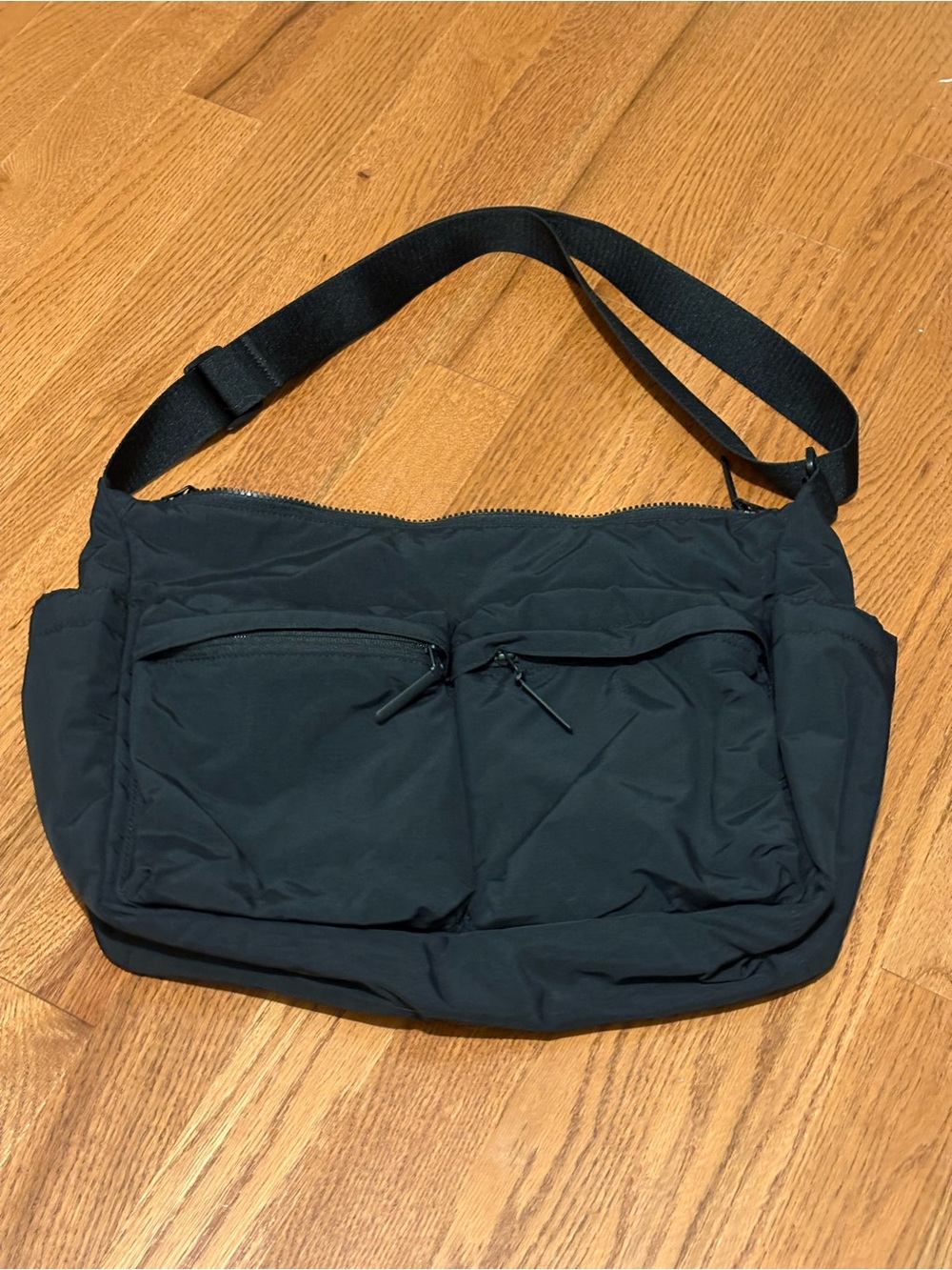 Black Lightweight Messenger Bag with Front Zip Pockets
